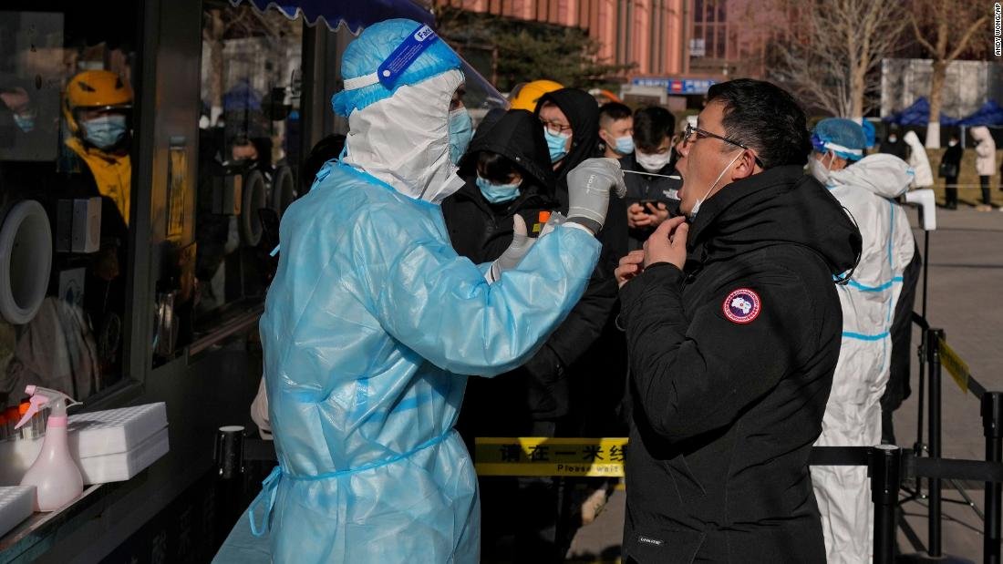 Beijing locks down office building weeks before Olympics over single Omicron case