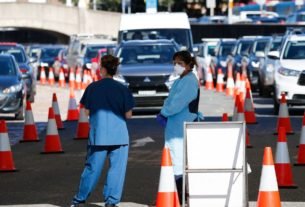 Australia suffers deadliest day of pandemic as Omicron drives up hospital cases