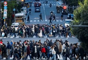 Japan poised to widen COVID-19 controls as Omicron drives record infections