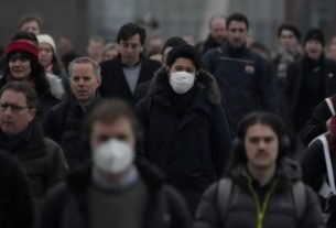 WHO: Pandemic may be more manageable after Omicron wave ends