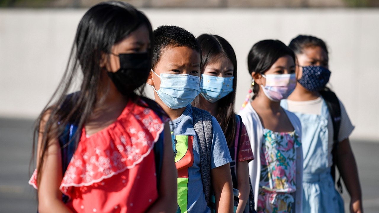Doctors argue in Washington Post to make masks optional in schools: 'Give them their childhood back'