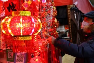 China's economy loses steam as COVID-19 erupts, c.bank cuts rates