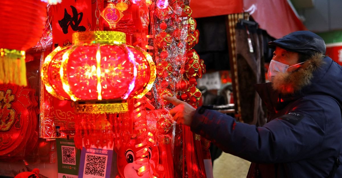 China's economy loses steam as COVID-19 erupts, c.bank cuts rates