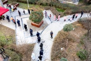Chinese cities on high COVID-19 alert as Lunar New Year travel season starts; Omicron spreads