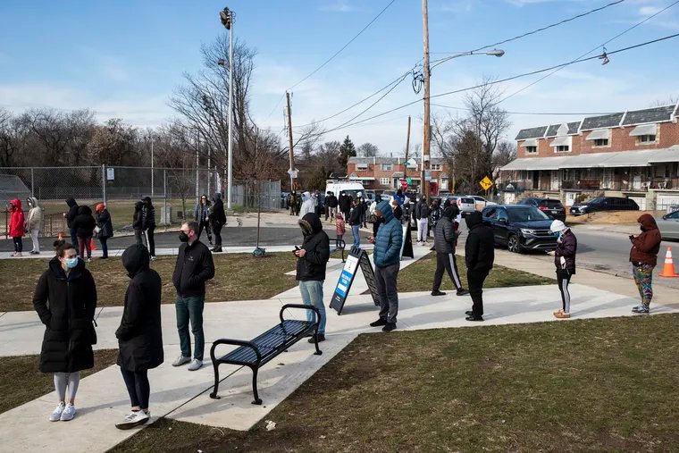 People wait in line to get tested for COVID-19 at a FEMA-run site at the Cibotti Recreation Center in early January.