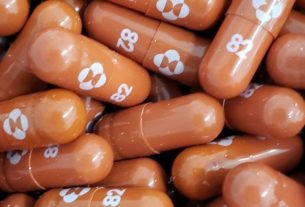 Merck's COVID-19 pill active against Omicron in lab studies