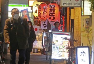 Japan is ramping up COVID-19 restrictions as omicron cases surge : NPR