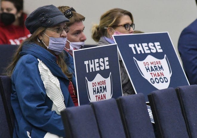 The New Hanover County Board of Education voted again on the district's mask mandate Tuesday Feb. 1, 2022 after reinstating it in January. Just over a dozen people came out to speak against reinstating the mask mandate in New Hanover County Schools. [KEN BLEVINS/STARNEWS]